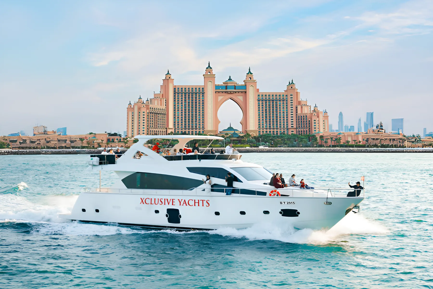 Luxury shared yacht cruising past the Dubai Marina skyline